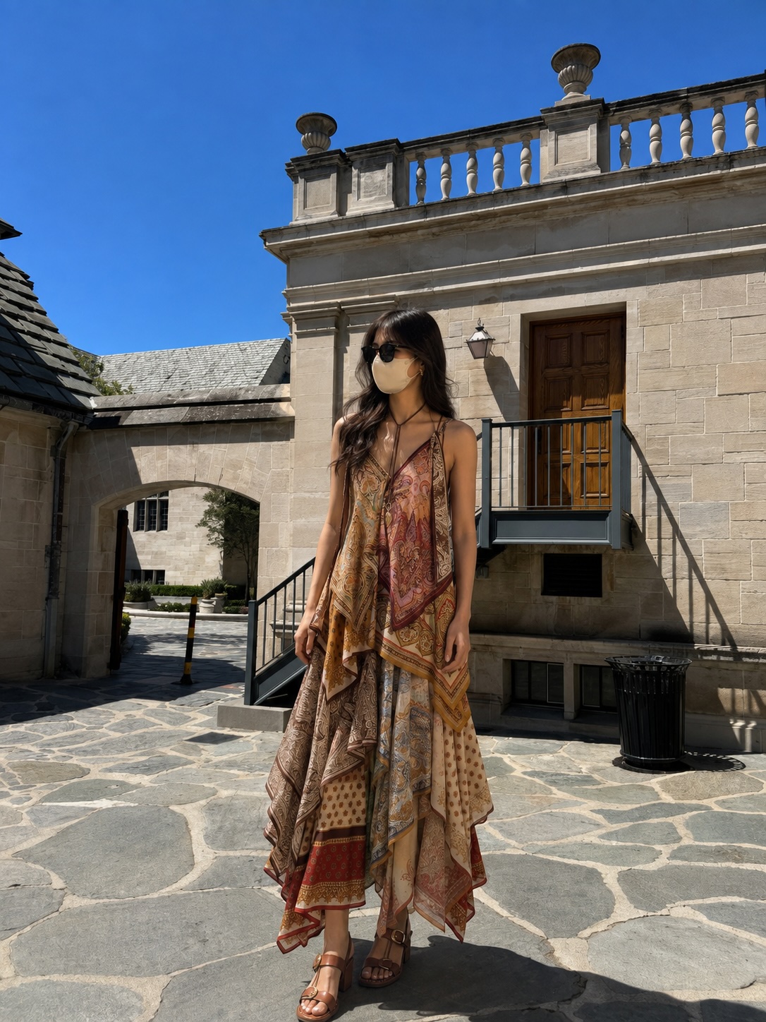 Courtyard look: scarf-print handkerchief maxi dress, leather sandals, sunglasses